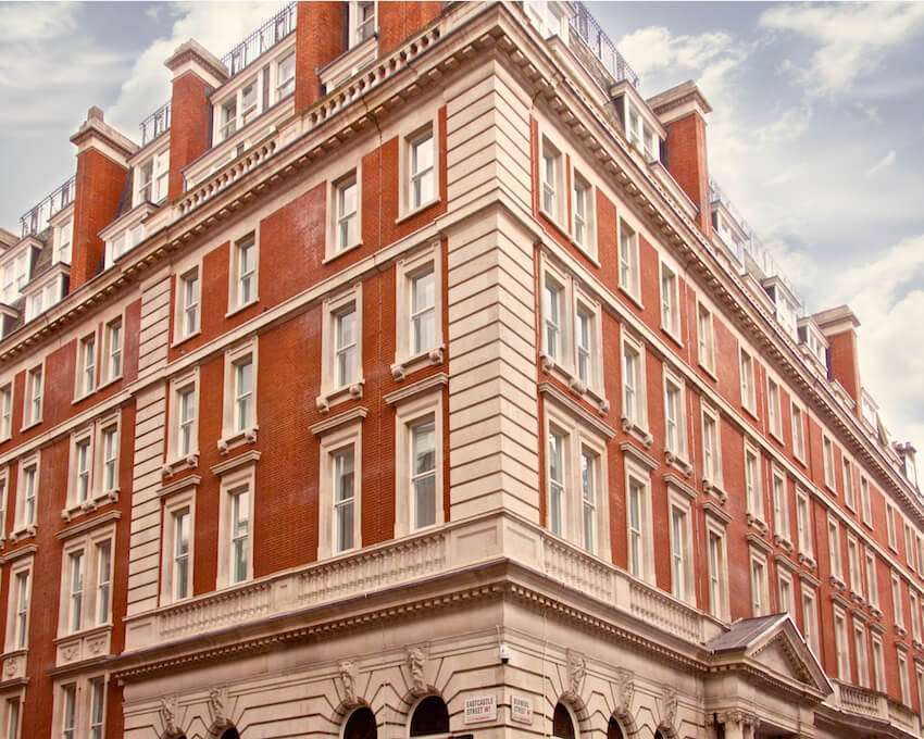 Traditional London building with white sash windows