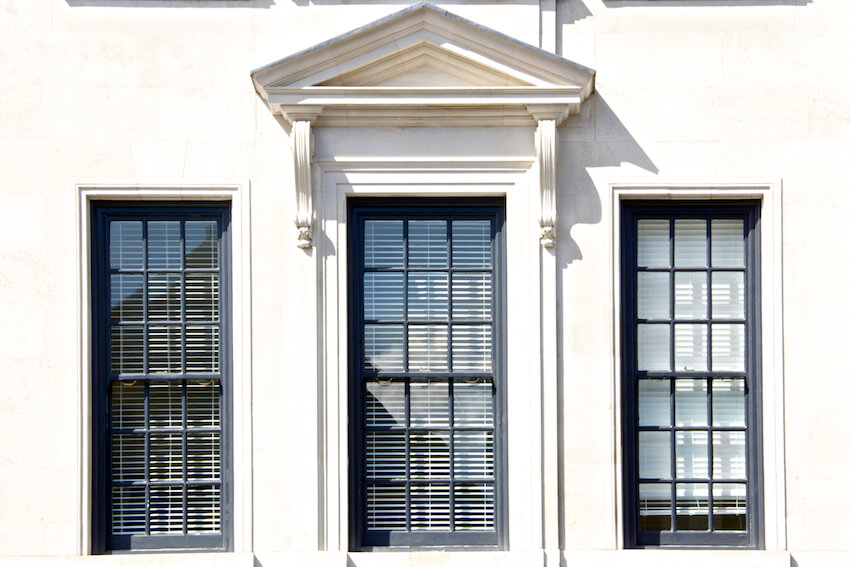 Black framed authentic sash windows with a timber frame