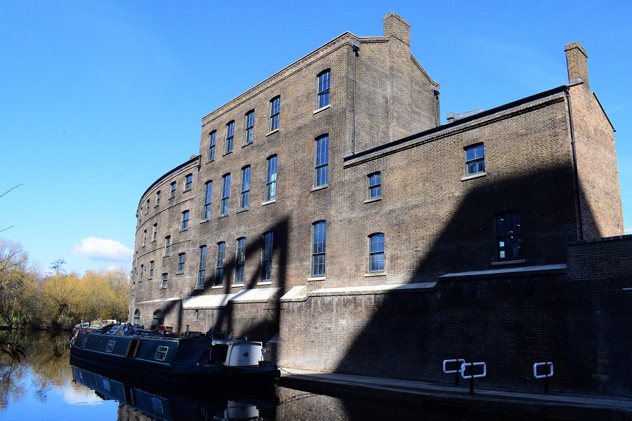 Canal facing building new windows with the appearance of a traditional sash window